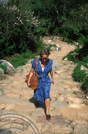 T03091. Wendy walking up Chamundi Hill. Mysore. Karnataka. India. December 1991.