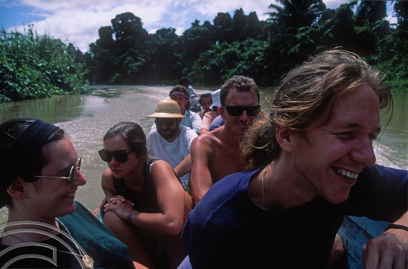 T03734. The gang going inland by canoe. Siberut. Mentawai Islands. Indonesia.  16th June 1992