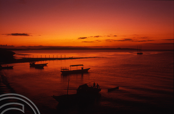 T04131. Sunset over the harbour. Semau Island. Timor. Indonesia. 14th September 1992