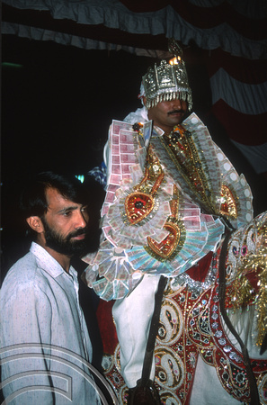 T02885. Indian wedding procession. Groom. Paharganj. Delhi. India. 16th October 1991