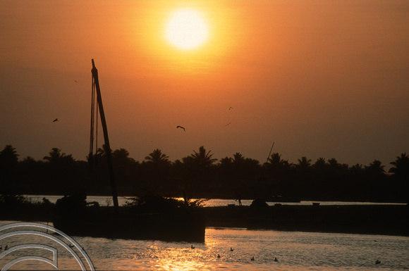 T03144. Sunset at the harbour. Mangalore. Karnataka. India. 28th January 1992.