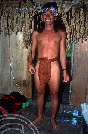 T03794. Our guide, Joni in traditional clothing. Siberut. Mentawai Islands. Indonesia. 19th June 1992