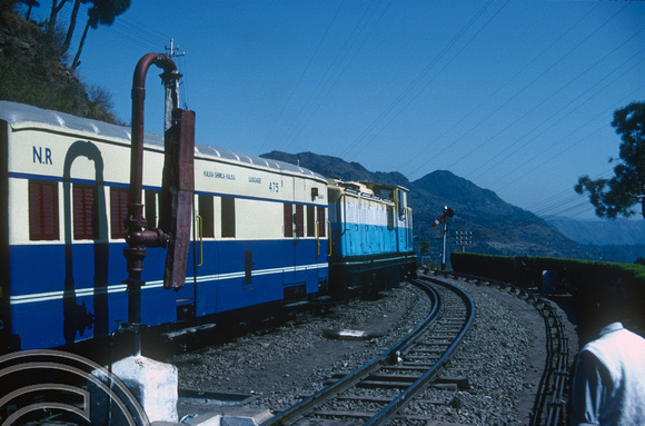 T02915. Passing a Kalka - Shimla train. Himachal Pradesh. India. 22nd October 1991