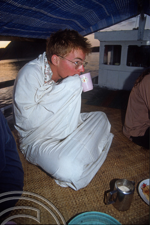 T04016. Morning coffee on the boat to Komodo. Indonesia. 2nd September 1992