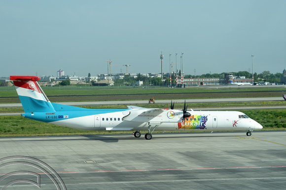 DG369972. LX-LQC. Luxair. De Havilland Canada Dash 8-400.  Brandenberg airport. Berlin. 9.5.2022.