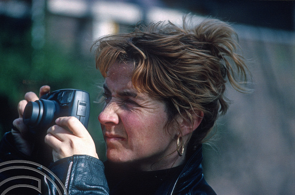 S0365. Lynn. With her old film camera. Coventry. 27.2.1994