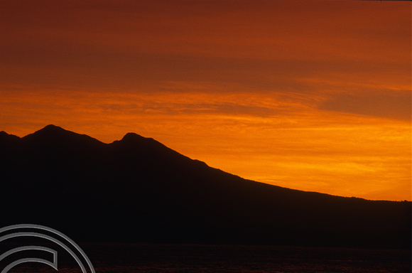 T4855. Sunrise over Lombok. Gili Trawangan. Lombok. Indonesia. December. 1994
