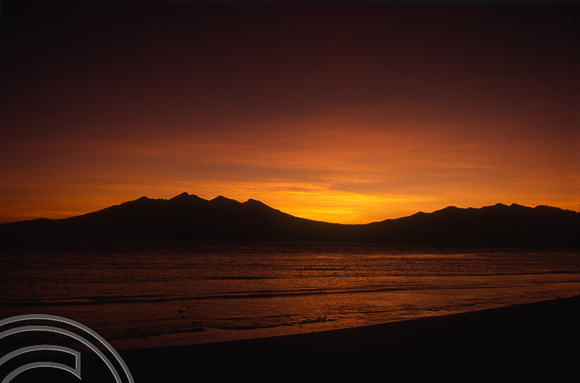 T4858. Sunrise over Lombok. Gili Trawangan. Lombok. Indonesia. December. 1994