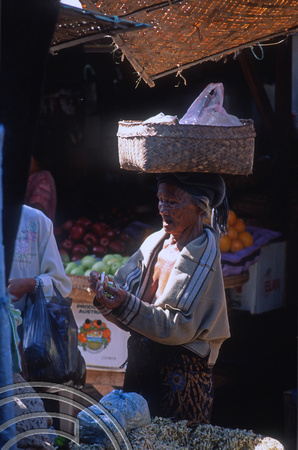 T4932. Old woman in the food market. Ubud. Bali. Indonesia. December. 1994