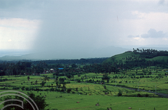 T5004. Rainstorm passes through. Tirtagangga. Bali. Indonesia. January 1995