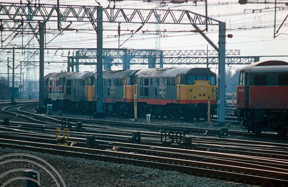 01727. 31s on shed including 31970. Crewe. 06.02.1991