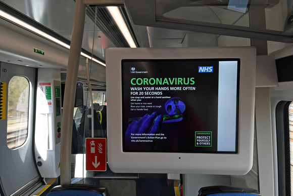 DG341510. Coronavirus warning on a Northern train. 17.3.20.