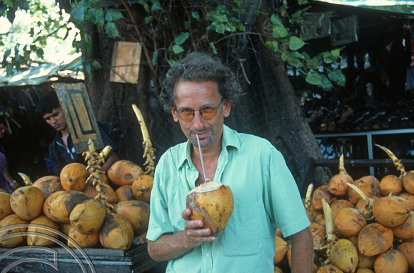 T15131. Me drinking from a coconut. Fort. Colombo. Sri Lanka. 15.01.2002