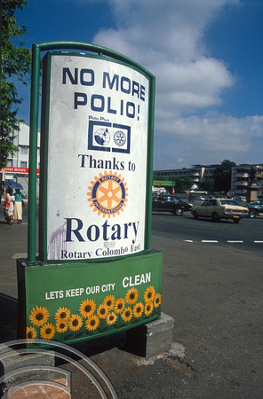 T15139. Rotary club sign about polio. Cinnamon Gardens. Colombo. Sri Lanka. 15.01.2002