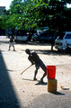 T15145. Local play cricket in the street during a public holiday. Pettah. Colombo. Sri Lanka. 15.01.2002