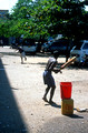 T15144. Local play cricket in the street during a public holiday. Pettah. Colombo. Sri Lanka. 15.01.2002