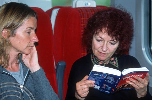 T15513. Lynn and Didi on the train from London to Salisbury. 25.05.2003