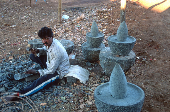 T9579. Cutting spice grinding stones. Arambol. Goa India. 06.02.2000