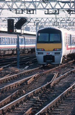 04193. 321316. Passing new signals and removed switches. Stratford. September.1994