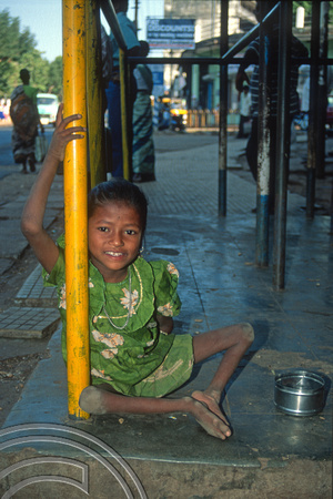 T9610. Girl with polio begging. Margao. Arambol. Goa. India. 09.02.2000