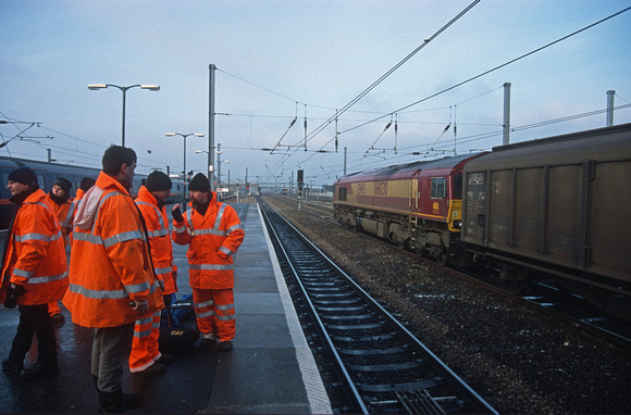 10106. 66030. Passes rail staff on the station. Peterborough. 03.01.2002