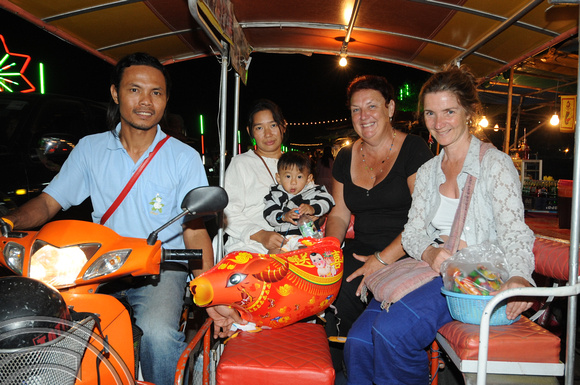 TD10754. Homeward bound. Temple festival. Thailand. 23.1.09.