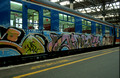 08569. SWT unit 1314, (70994) covered in graffiti. London Waterloo. 06.12.00