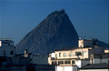 T13482. A plane flies past Morro da Urca. Rio de Janeiro. Brazil. 7.8.2002