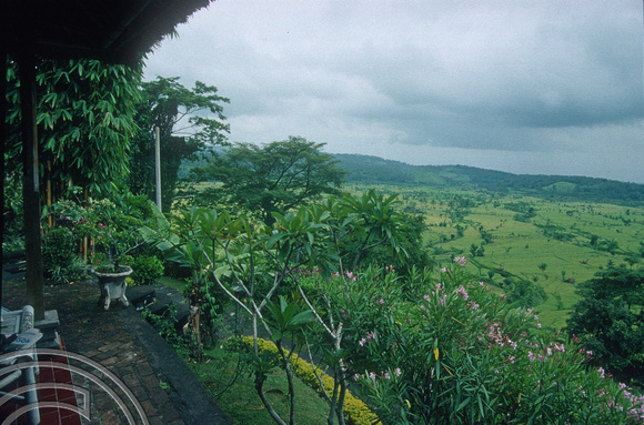 T5068. View from the Homestay on the hill. Rain storm. Tirtagangga. Bali. Indonesia. December 1994.