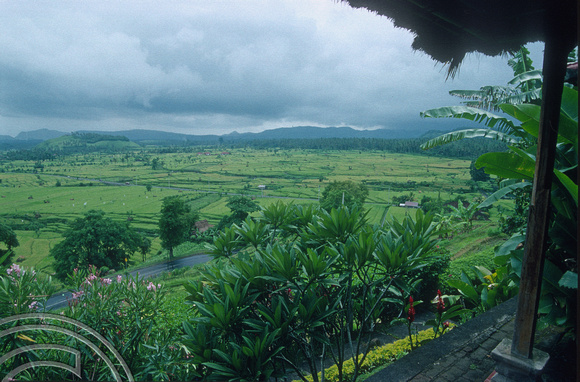 T5067. View from the Homestay on the hill. Rain storm. Tirtagangga. Bali. Indonesia. December 1994.