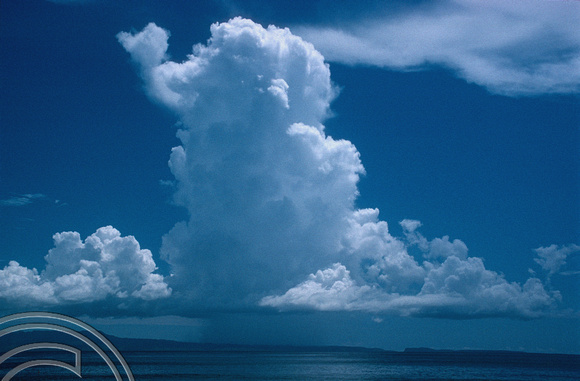T5087. Rainclouds over Nusa Penida. Bali. Indonesia. January 1995