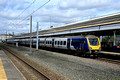 DG414055. 331027. 331015. 1Y63. 1125 Blackpool North to Manchester Airport. Bolton. 11.4.2024.
