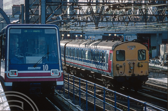 3773. DLR No 10 and 302222. Fenchurch St. 05.04.94