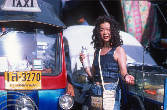 T7258. Hiring a Tuk-Tuk. Khao San Rd. Bangkok. Thailand. May 1998