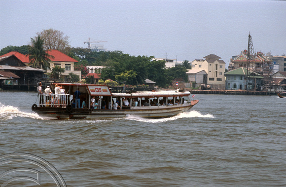 T7271. Water taxi on the Chao Praya river. Bangkok. Thailand. May 1998