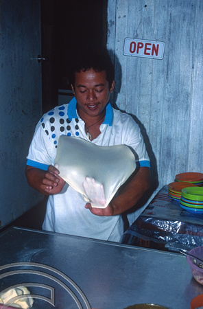 T7375. Eddy making Murtabaks. Tioman Island. Malaysia. June 1998