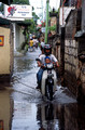 T5209. Poppies Gang flooded. Kuta. Indonesia. 14th January 1995.