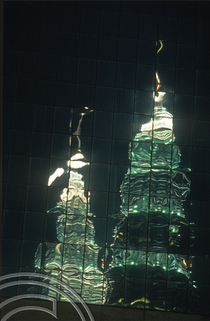 T7429. Reflections of the Petronas Tower at night. Kuala Lumpur. Malaysia. July 1998