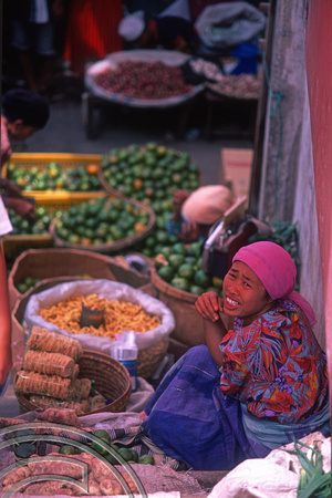 T7584. Stallholder in the market. Bukittinggi. West Sumatra. Indonesia. 12th August 1998