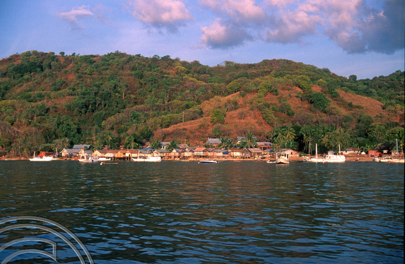 T7704.  The town seen from thr harbour. Labuanbajo. Flores. Indonesia. September 1998