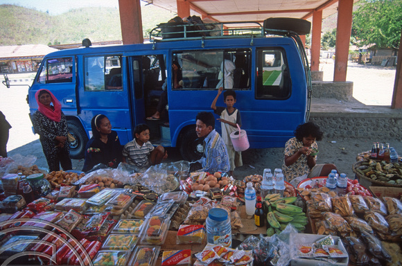 T7681. Selling snacks at the bus station. Bima. Sumbawa. Indonesia. 10th September 1998