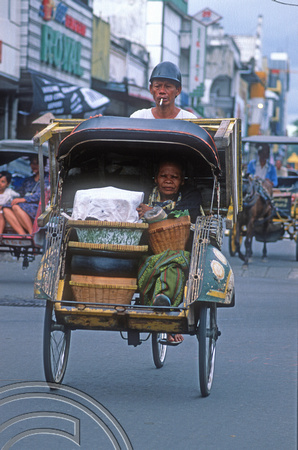 T8353. Woman in a Becak. Yogyakarta. Java. Indonesia. December 1998