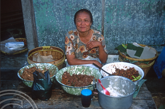 T8355. Woman selling Javanese breakfast food. Yogyakarta. Java. Indonesia. December 1998