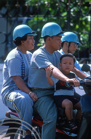 T8377. Family on a motorbike. Yogyakarta. Java. Indonesia. December 1998