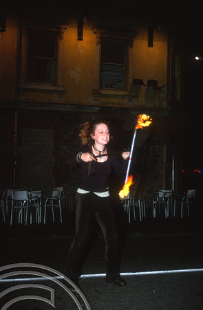 T8460. Woman busker in Brunswick St. Melbourne. Australia. December 1998