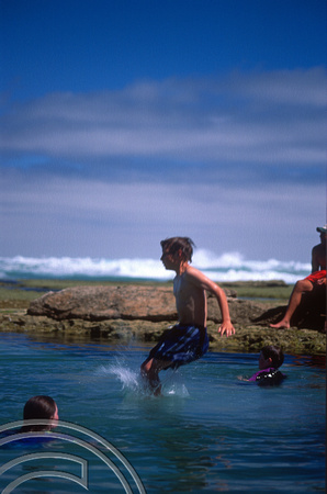 T8477. Matt diving at the back beach. Sorrento. Victoria. Australia. 31st December 1998