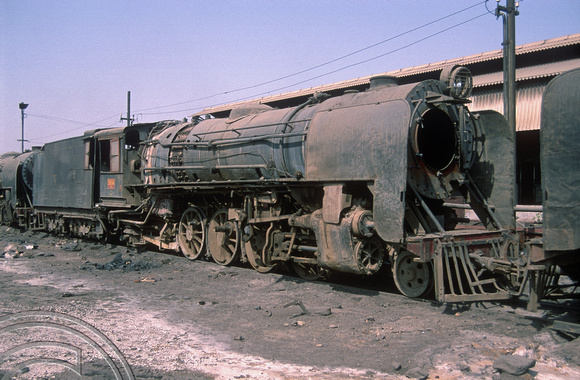 FR0043. YG 2-8-2 No 3694. Awaiting repair at the loco shed. Jaipur. Rajasthan. India. 30.10.1991
