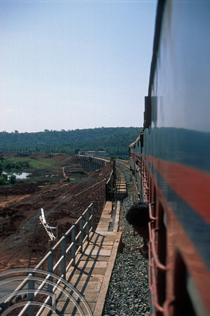 FR0255. DMU 15010. Crossing the Cortalim viaduct. Goa. India. 1st December 1997
