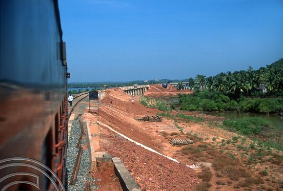FR0256. DMU 15010. Crossing the Cortalim viaduct. Goa. India. 1st December 1997