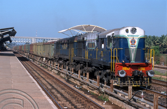 FR0400. WDM2s 18852 and 18163. Eastbound freight. Margao. Goa. India. 10.02.2000.